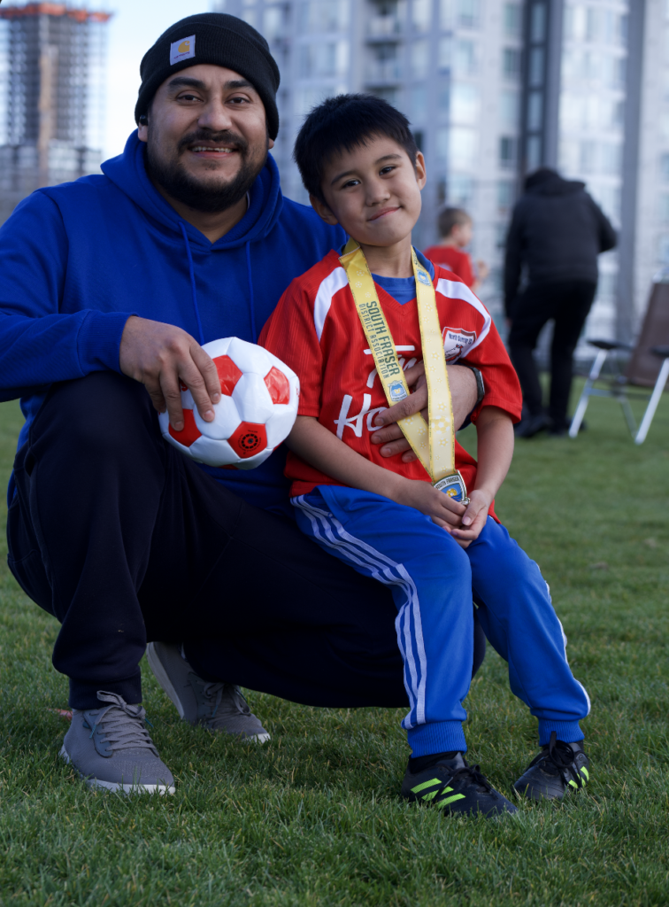 Father Supporting son at soccer practise in surrey, things todo in surrey, father and son activities